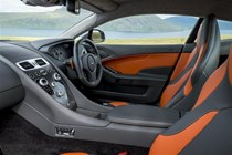 The orange and charcoal grey interior of the Tungsten Aston Martin Vanquish